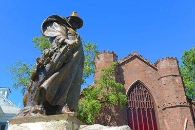 Roger Conant statue in front of Salem Witch Museum in Historic downtown Salem, Massachusetts MA, USA. clipart