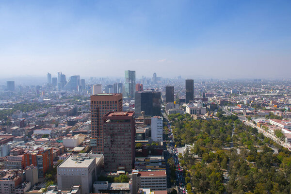 Historic center of Mexico City with CBD skyline on Avenue Paseo de la Reforma aerial view from Torre Latinoamericana, Mexico City CDMX, Mexico. Historic center of Mexico City is a World Heritage Site.