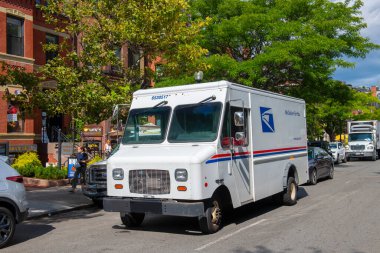 United States Postal Service USPS delivery truck on Newbury Street in Back Bay, Boston, Massachusetts MA, USA.  clipart