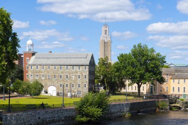 Historic Wilkinson Mill building in Old Slater Mill National Historic Landmark on Roosevelt Avenue in downtown Pawtucket, Rhode Island RI, USA.
