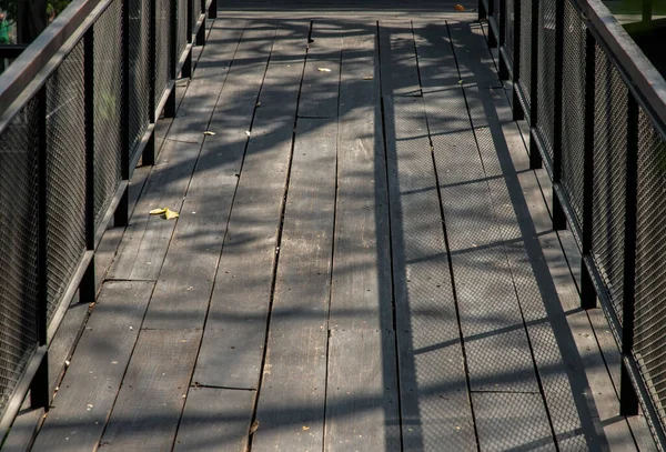 Old Brown Rustic Wooden Walkway Sunlight Shine Passed Trees Make — Stock Photo, Image