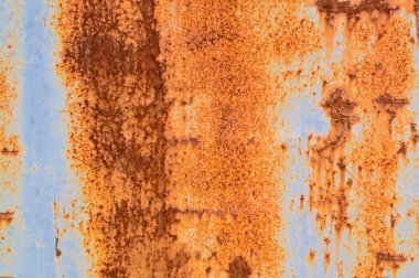 Paslı metal yüzey dokusu: koyu mavi, mavi, eski çatlak boya. Soyut arkaplan. Eski boya ve pas dokusu..