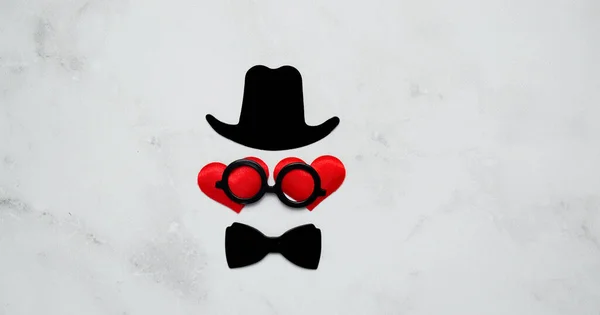 Hat, Eyeglasses, Red Heart, Mustache on white background. Valentines Day background top view. .Valentines day, international fathers day, love concept. copy space