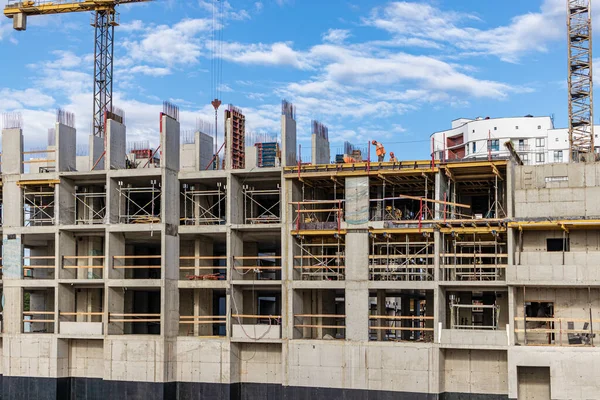 Construction of a monolithic reinforced concrete house. Modern building technologies. Construction of a modern multi-storey building