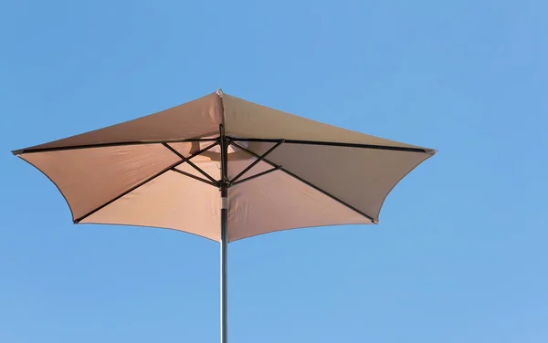 Beige parasol — Stock Photo, Image