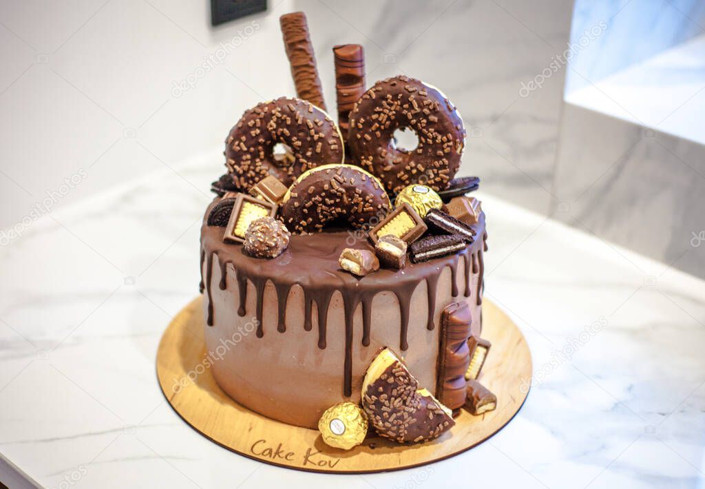 Men's birthday cake - chocolate with donuts