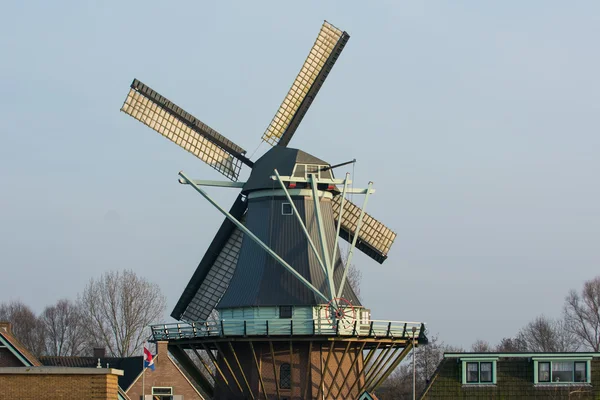 Sunset with old Dutch windmill — Stock Photo, Image