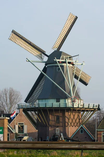 Sunset with old Dutch windmill — Stock Photo, Image