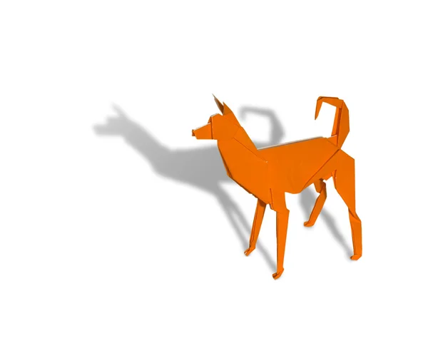Cão de Origami laranja isolado no branco — Fotografia de Stock
