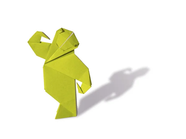 白で隔離される yellowo 折り紙猿 — ストック写真