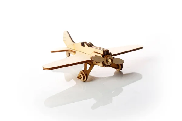 Small Wooden Airplane White Background Reflection Stock Photo