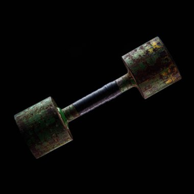 Siyah arkaplanda eski bir dambıl