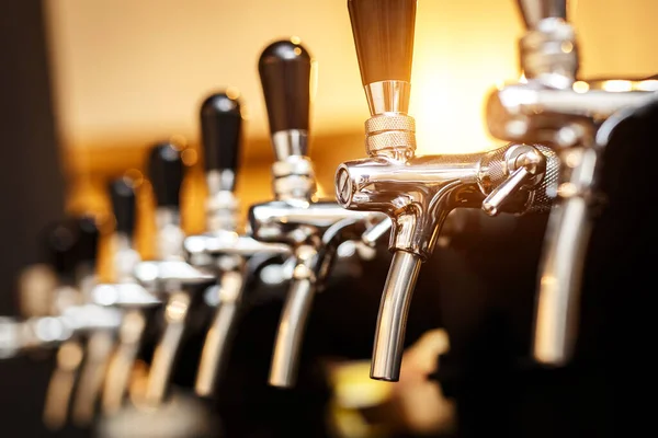 Row of taps in a beer tap