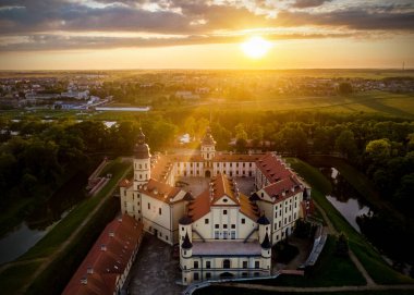 Medieval castle at sunset.Travel in Belarus, Nesvizh clipart