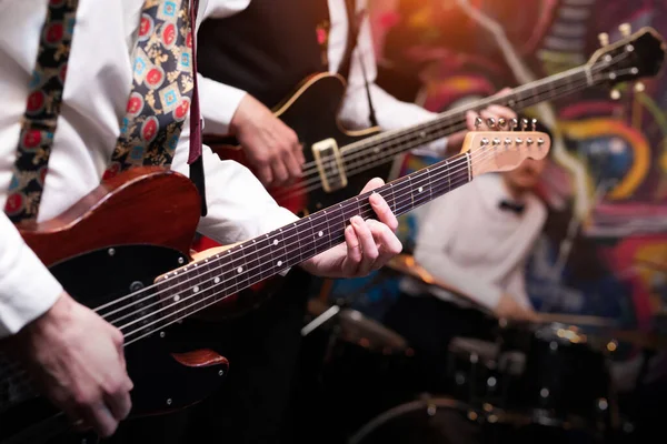 Guitars during a concert. Guitarists on a stage. — Fotografia de Stock