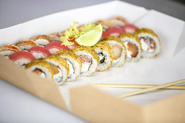 set of sushi, Japanese, salad, ginger, wasabi, in a box