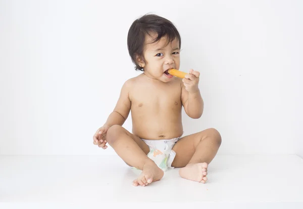 Baby eat biscuit — Stock Photo, Image