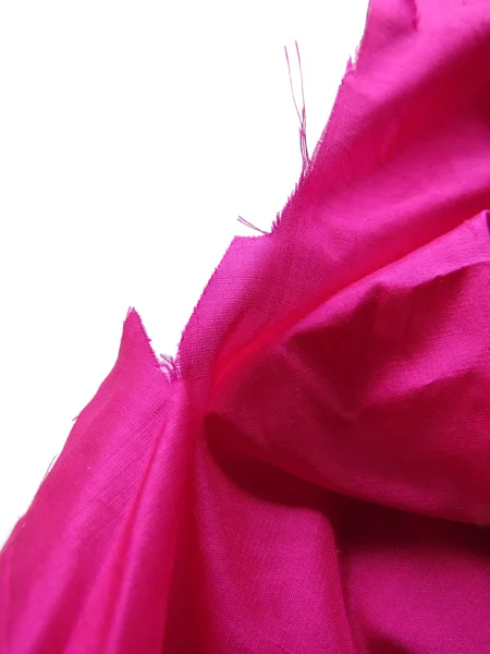 Pink silk unravels Stock Photo