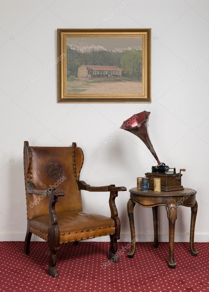 Leather Armchair Vintage Round Table And Painting On Red Carpet Stock Photo By Khaledeladawy 107096160 Leather Armchair Vintage Round Table, Retro Round Chair