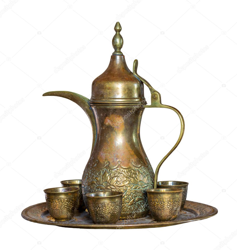 Turkish coffee set: Ottoman ornate coffee pot and ornate cups isolated on white with clipping path