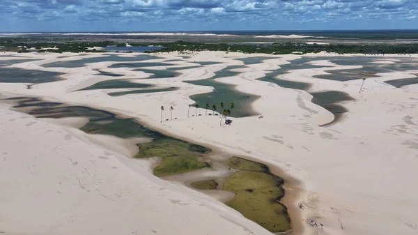 Small Sheets At Tutoia In Maranhao Brazil. Nature Landscape. Winding Sand Dunes. Small Sheets At Tutoia. Rainwater Lakes. Beautiful High Dunes. Summer Travel. Brazil Northeastern.