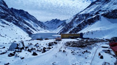 Del Inca Lake In Andes Mountains Valparaiso Chile. Chair Lift Transporting Skiers And Snowboarders. Snowy Tourism Iceland Blizzard. Iceland Lagoon Outdoor. Andes Mountains Valparaiso.