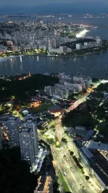 Sunset City At Downtown Rio In Rio De Janeiro Brazil. Plane Landing At The Airport In Background. Downtown Rio At Rio De Janeiro Brazil. Landing Darkness Skyline. Landing Skyline.