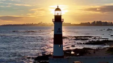 Sunset Beach At Salvador In Bahia Brazil. Sunset Landscape. Itapua Lighthouse. Travel Destinations. Sunset Beach In Salvador In Bahia Brazil. Nature Seascape.