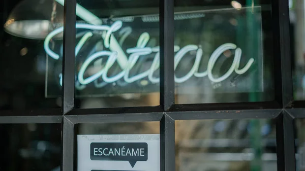 Blue Tattoo Light Sign from a Barber Shop and Tattoo Studio — Stock Fotó