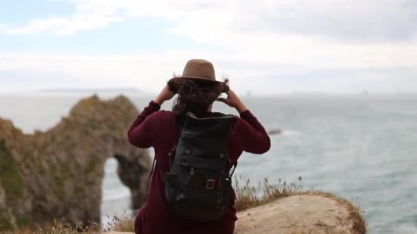 Woman Enjoying the View of the Jurassic Coast During a Windy Day — Stock Video