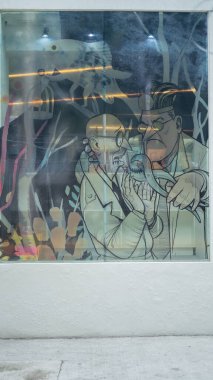 Bir Diş Hekiminin Karikatür Fotoğrafı ve Hastası Pencereye Boyalı