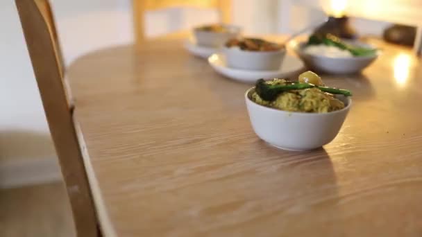 Green Vegetarian Dish in a White Bowl and on a Wooden Table — Wideo stockowe