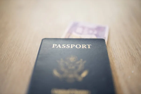 United States of America Passport with a Two Honduran Lempiras Bill Under it — Foto de Stock