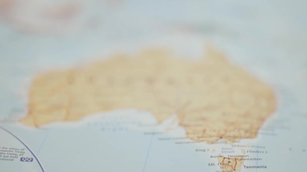 Up-Close View of Australia on a Colorful and Blurry Oceania Map — Stock videók