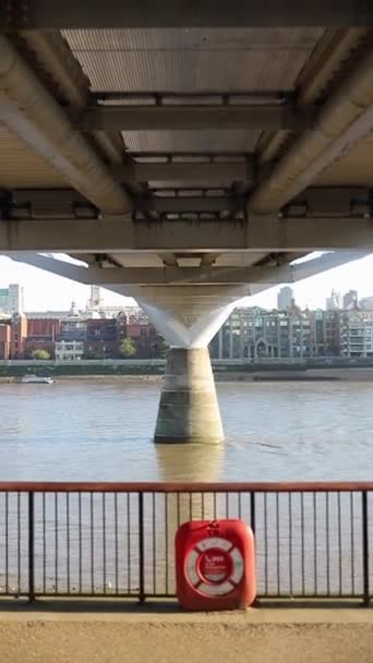 Close up from Underneath Millennium Bridge with the River Thames Below — Stockvideo