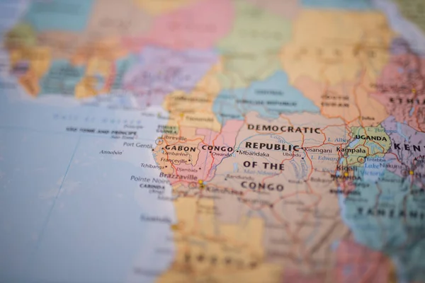 Congo on a colorful and blurry map of Africa with its main routes in red — Fotografia de Stock