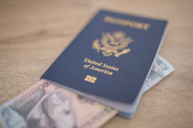 United States of America Passport with a Five Honduran Lempiras Bill Inside clipart