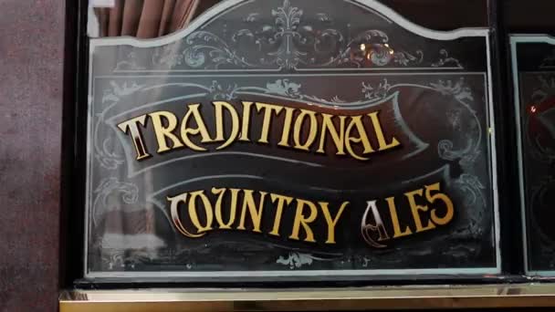 View of a Pub Window with a Traditional Country Ales Sign — Stock Video