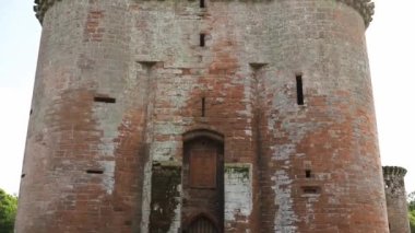 Ancient Ruins of an Medieval European Fortress Under a Cloudy Sky