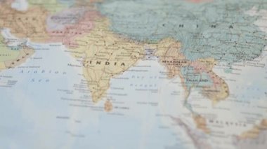 View of South Asia on a Colorful and Blurry World Map