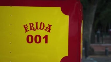 The Name and Number Frida 001 for a Red and Yellow Tram