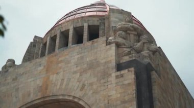 Top of the Monument to the Revolution from Mexico City Behind a Tree