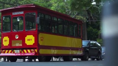 Red and Yellow Tram Parked on a Street From The Neighbourhood Called Coyoacan