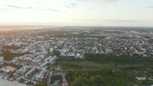 City Flyover from Crystal Blue Ocean to Sleepy City — Stock Video