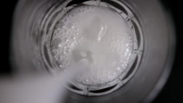 Pouring traditional Mexican horchata water into a glass — Stock Video