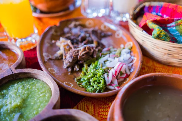 Mexican chopped lamb meat, condiments, and two jars of refreshing drink — Stock Photo, Image