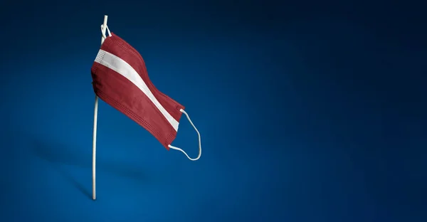 Latvia Mask Dark Blue Background Waving Flag Latvia Painted Medical — Stock Photo, Image