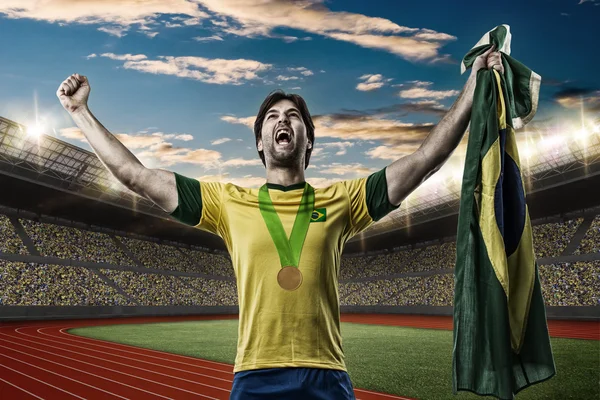 Atleta Celebrando una medalla de oro — Foto de Stock