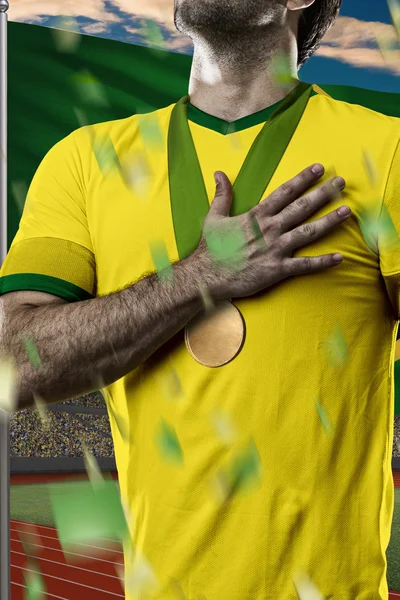 Atleta Celebrando una medalla de oro — Foto de Stock