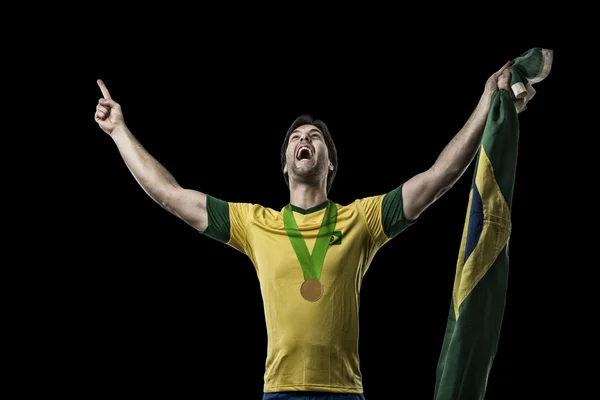 Atlet fira en gyllene medalj — Stockfoto